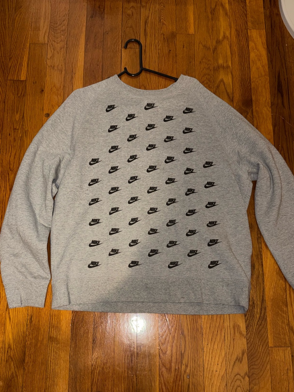 Nike Men’s Light Gray Crewneck Sweatshirt with Black Swoosh Pattern